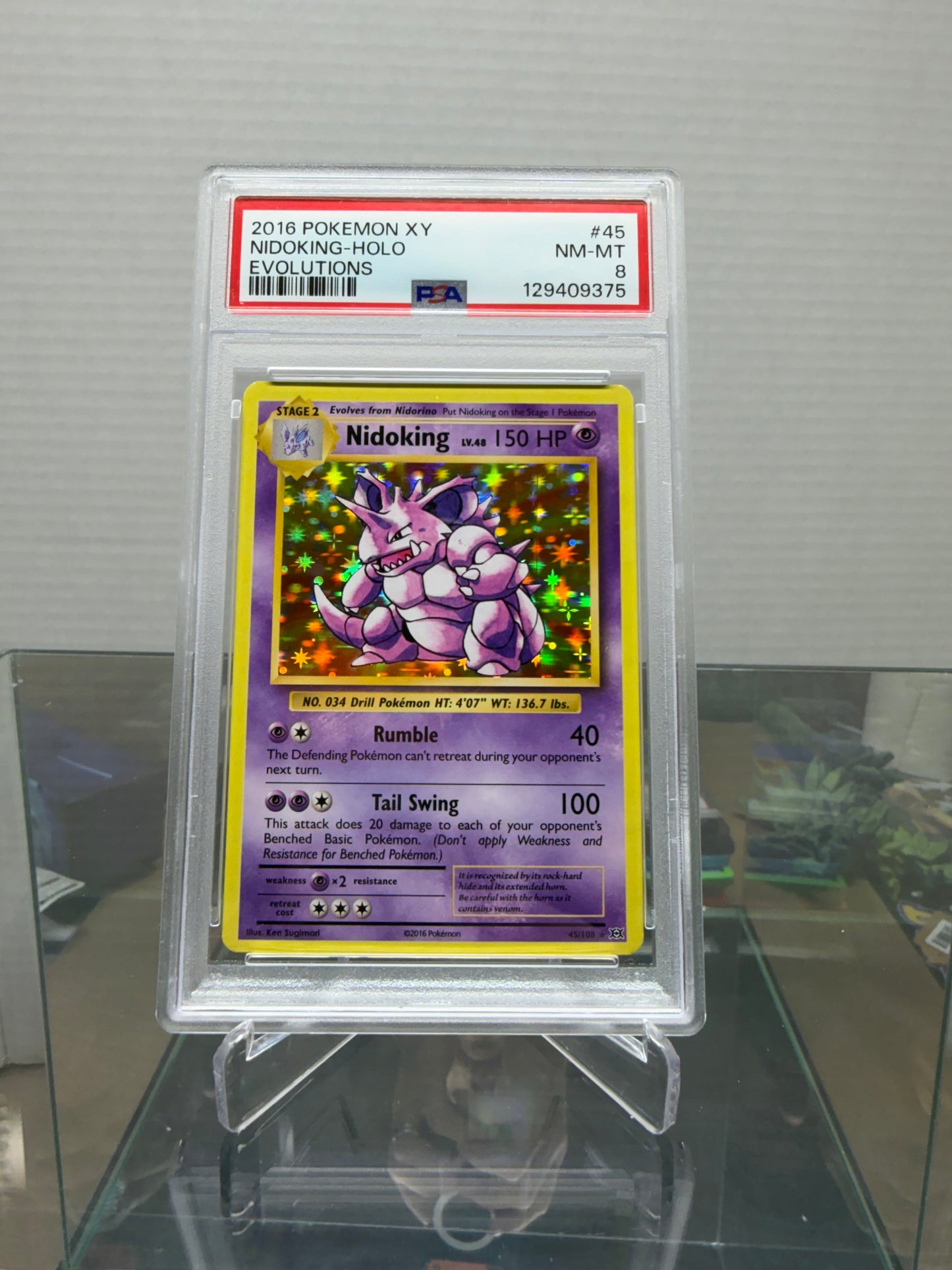 2016 POKÉMON XY NIDOKING-HOLO EVOLUTIONS NM-MT PSA 8