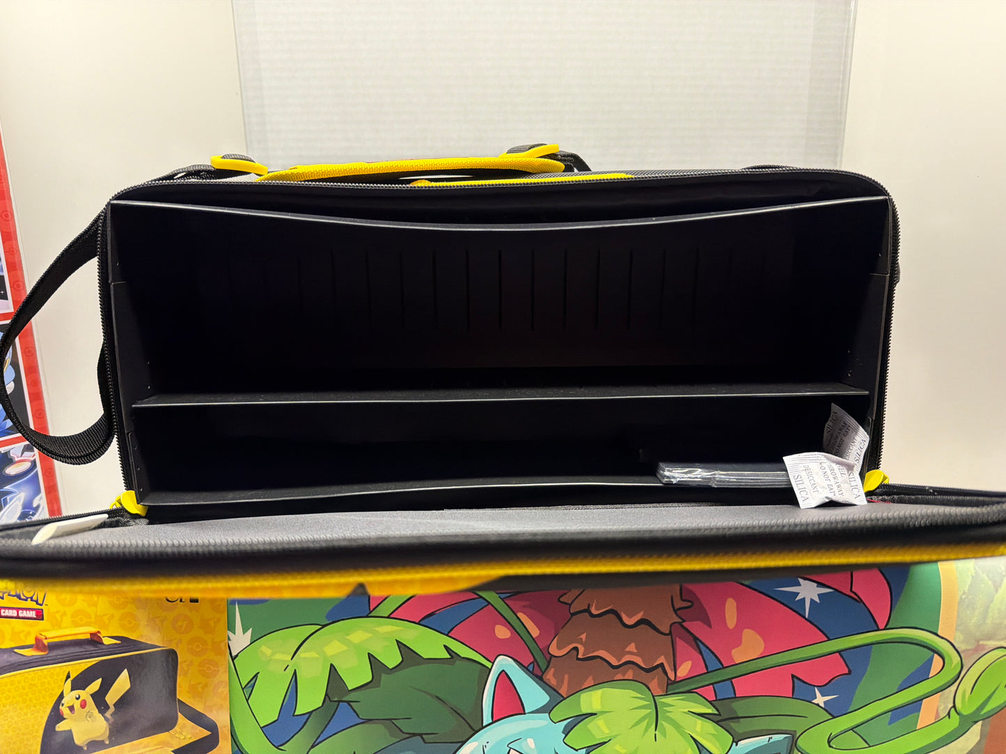 Pokémon deluxe gaming trove with Pikachu on the front